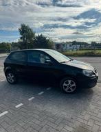Volkswagen Polo 1.2 44KW 2009 Zwart, Auto's, Voorwielaandrijving, 989 kg, 1198 cc, Zwart