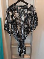 Shiwi zwart witte pareo maat L, Kleding | Dames, Badmode en Zwemkleding, Overige typen, Zwart, Ophalen of Verzenden, Zo goed als nieuw