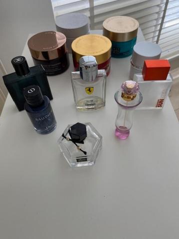 Verzameling parfumflesjes en rituals bodycreme potten beschikbaar voor biedingen