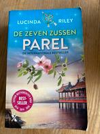 De Zeven Zussen - Parel, Lucinda Riley, Boeken, Romans, Ophalen of Verzenden, Gelezen, Nederland