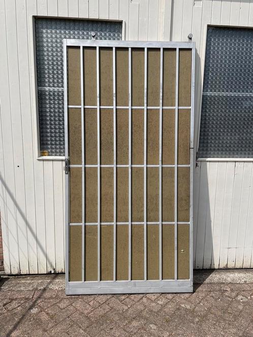 Tralieschuifdeur met haakslot, Doe-het-zelf en Verbouw, Deuren en Horren, Gebruikt, Overige typen, 215 cm of meer, 100 tot 120 cm