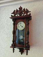 Antieke houten wandklok, Ophalen