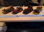 4 houten auto's, Ophalen