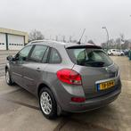 Renault Clio Estate 1.2 TCE Night & Day, Auto's, Renault, Voorwielaandrijving, Euro 5, Gebruikt, Zwart