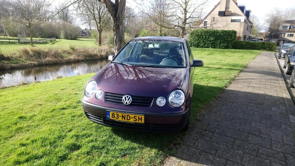 Volkswagen Polo 1.4 55KW 2003 Rood, Auto's, Voorwielaandrijving, 4 cilinders, Origineel Nederlands, Handgeschakeld