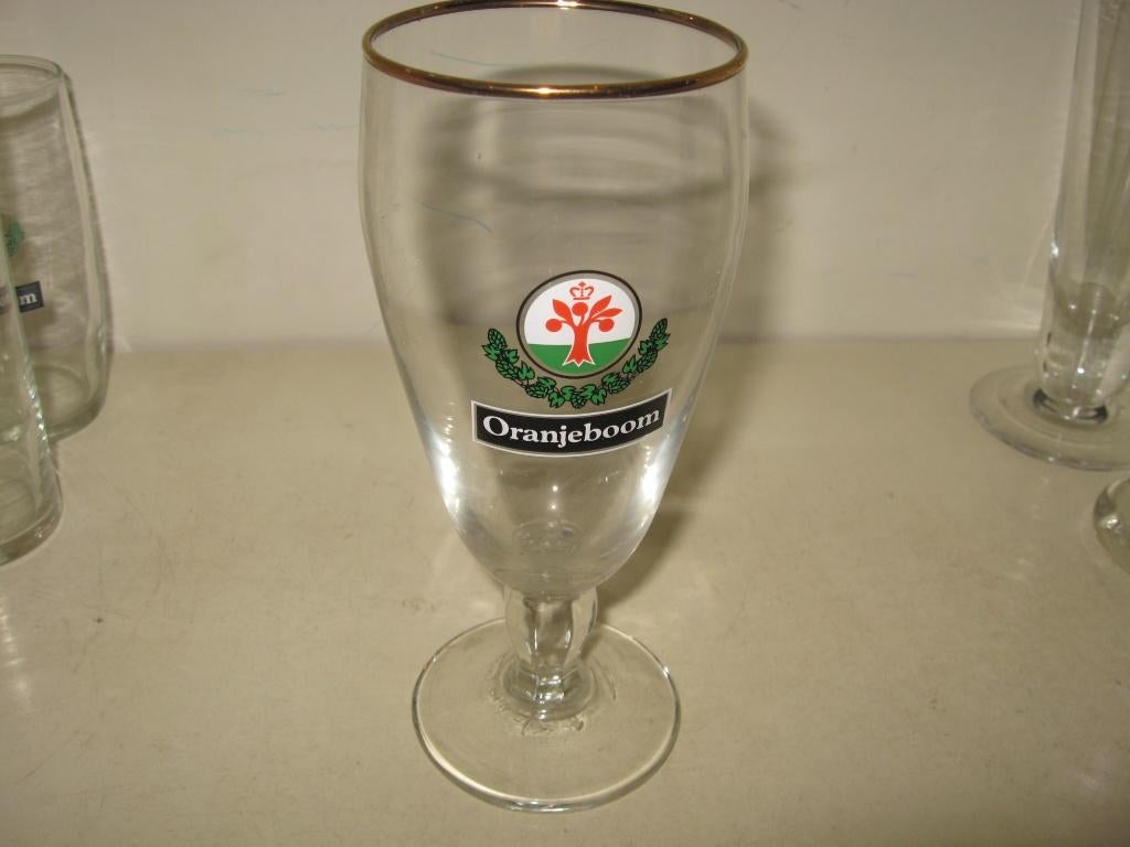 Oranjeboom in zwarte balk #7 ... voetglas, Verzamelen, Biermerken, Ophalen of Verzenden, Zo goed als nieuw, Glas of Glazen, Oranjeboom
