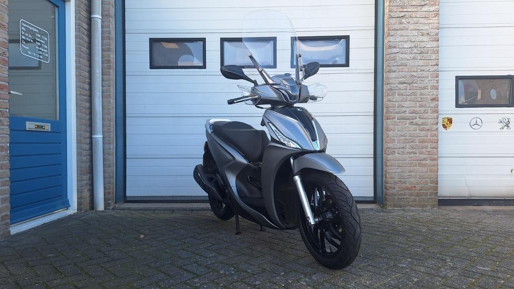Kymco new People s /bromscooter /alarm, Fietsen en Brommers, Scooters | Kymco, Zo goed als nieuw, People S, Maximaal 45 km/u, Benzine