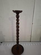 Getorste asbak van hout, Ophalen