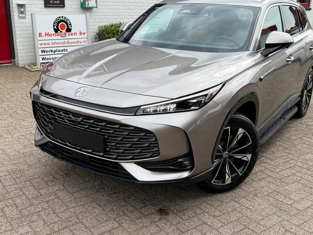 MG Hs 1.5T GDI PHEV Aut Comfort/ Nieuwe voorraad auto/ Beige, Auto's, MG, Automaat, Stof, Gebruikt, 4 cilinders