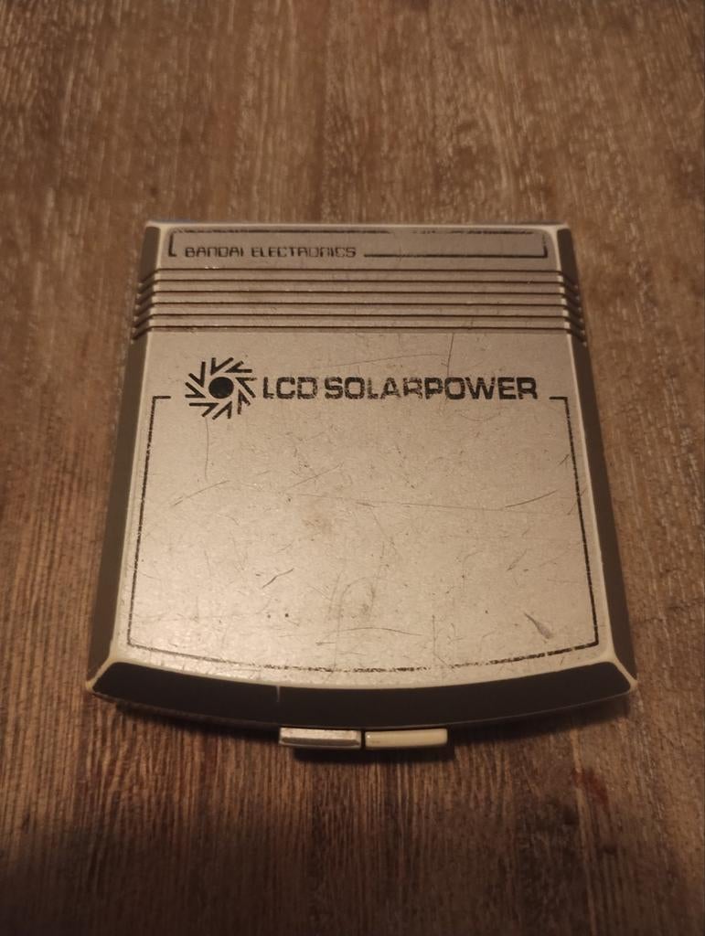 Bandai electronics spelcomputer LCD solar power handheld, Verzenden, Gebruikt