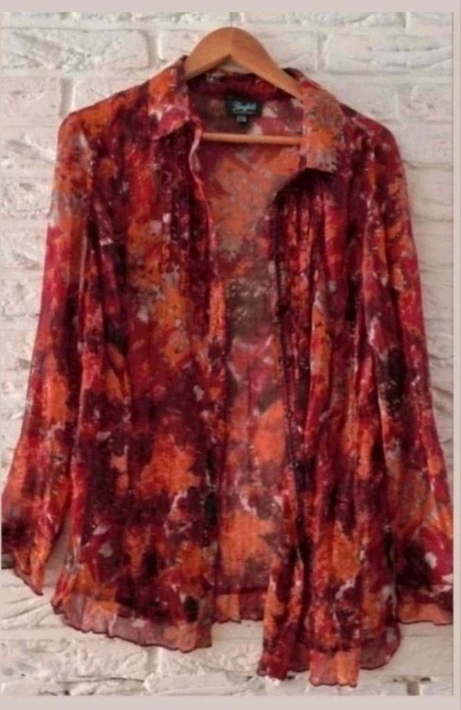 Voile blouse
Maat 44, Kleding | Dames, Blouses en Tunieken, Ophalen of Verzenden, Gedragen, Maat 42/44 (L), Oranje