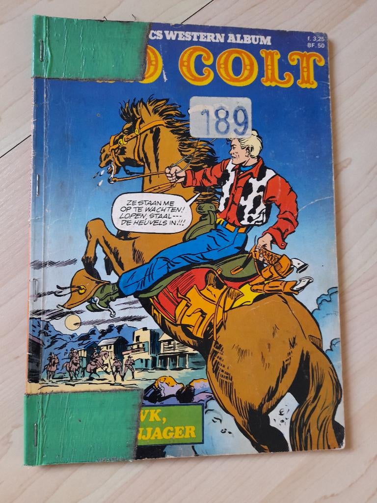 STRIPBOEK KID COLT SAM HAWK DE MENSENJAGER, Boeken, Eén stripboek, Ophalen of Verzenden, Gelezen