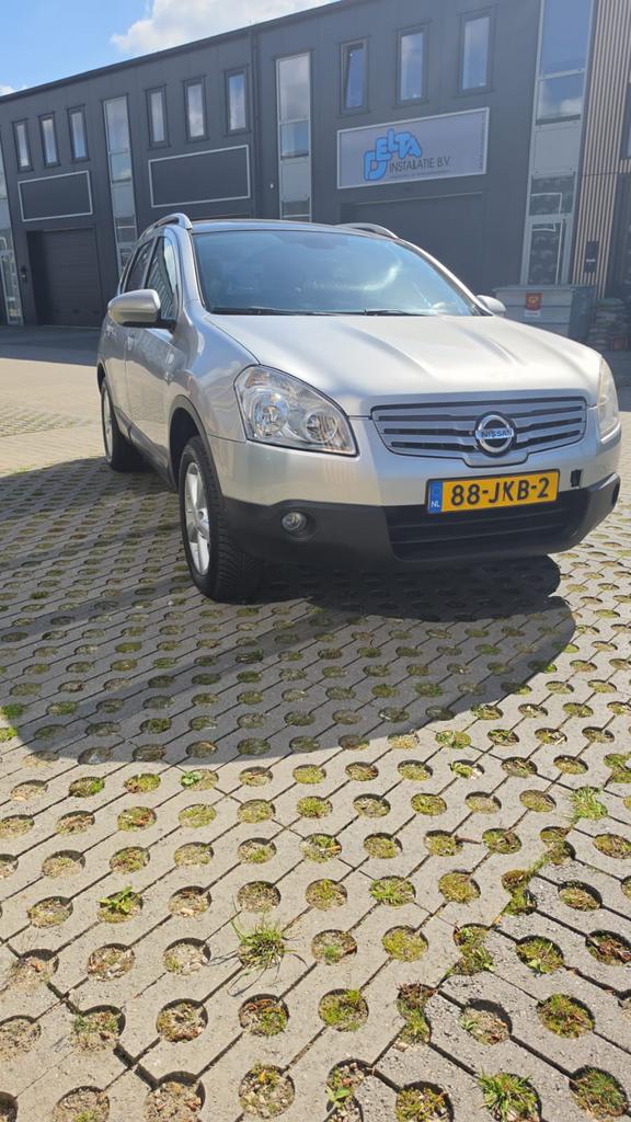 Nissan Qashqai 1.6 2WD 7 persoons 2009 Grijs 092.000 km nap, Auto's, Voorwielaandrijving, Zwart, 4 cilinders, 7 stoelen