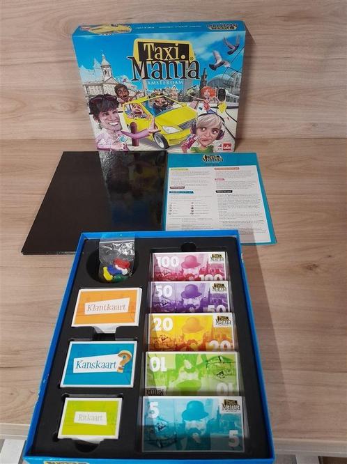 taxi mania amsteram [s1070], Hobby en Vrije tijd, Gezelschapsspellen | Bordspellen, Zo goed als nieuw, Ophalen of Verzenden