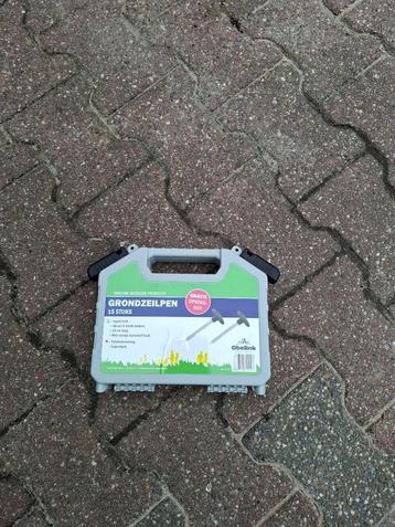 Set grondzeil pennen beschikbaar voor biedingen