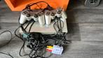 Playstation 2 Zilver met 2 bakken spellen en films, Spelcomputers en Games, Spelcomputers | Sony PlayStation 2, Ophalen of Verzenden