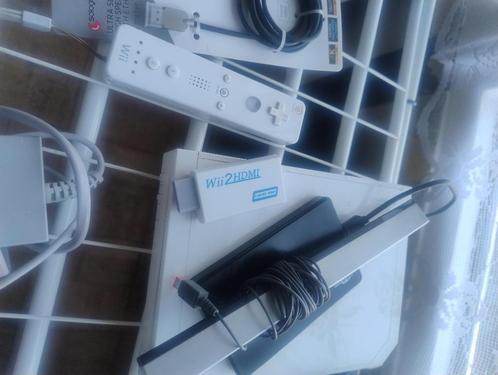 mooie wi set met ruim 300 spellen, Spelcomputers en Games, Spelcomputers | Nintendo Wii, Gebruikt, Met games, Met stuurtje, Ophalen of Verzenden