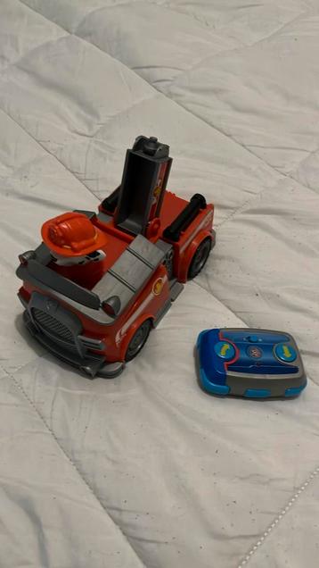 Afstand bestuurbare brandweerauto Marshall van PAW Patrol beschikbaar voor biedingen