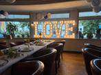 Lichtletters “LOVE” huren, Ophalen