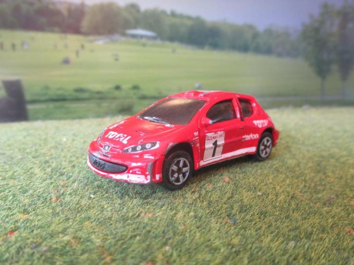 1:57 Peugeot 206 WRC - Majorette, Hobby en Vrije tijd, Modelauto's | Overige schalen, Gebruikt, Auto, Ophalen of Verzenden