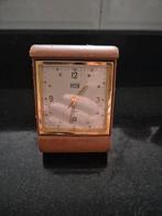 Vintage ImHof reiswekker, Ophalen