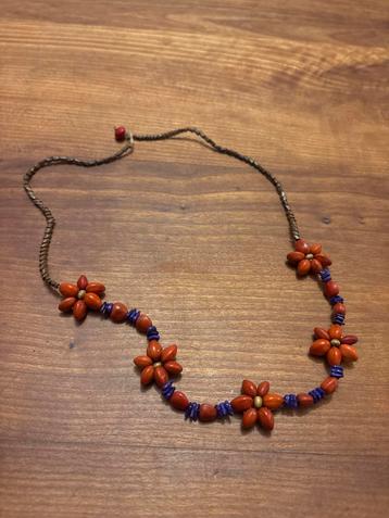 Bloemenketting met kralen beschikbaar voor biedingen