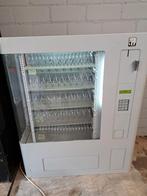 Muur automaat snacks, Ophalen