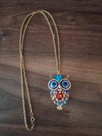 Goudkleurige ketting met hanger met uil met steentjes., Ophalen of Verzenden, Zo goed als nieuw, Goud, Overige materialen