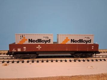 Hogebakwagon met containerlading beschikbaar voor biedingen