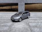 Opel Astra J Sports Tourer 2011 Karbongrau 1/43 Minichamps, Hobby en Vrije tijd, Modelauto's | 1:43, Ophalen of Verzenden, Zo goed als nieuw