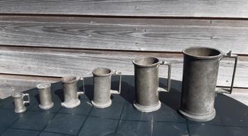 Vintage tinnen maatbekers beschikbaar voor biedingen