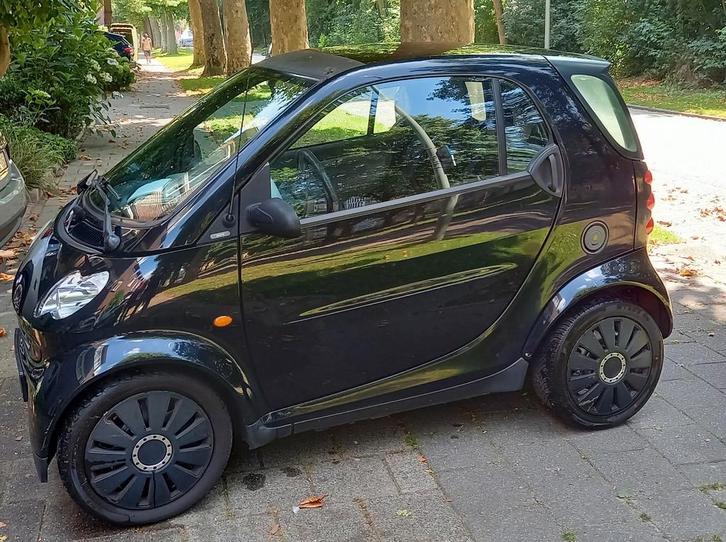 Smart 0.7 City Coupe 45KW 2003 Zwart APKsept'26, Auto's, Smart, Particulier, City-Coupe, Airbags, Airconditioning, Centrale vergrendeling