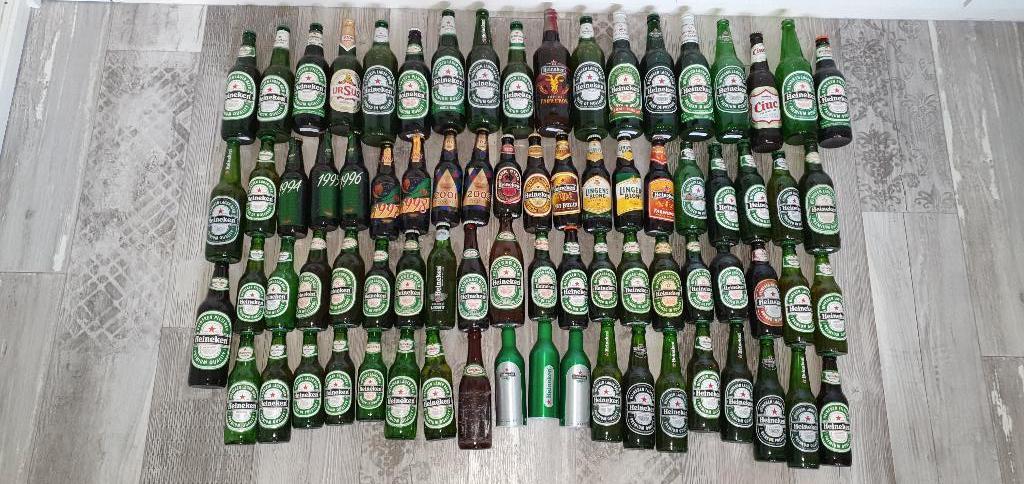 Grote serie Heineken flesjes 75+. Meerderheid vol, Ophalen of Verzenden, Zo goed als nieuw, Flesje(s), Heineken