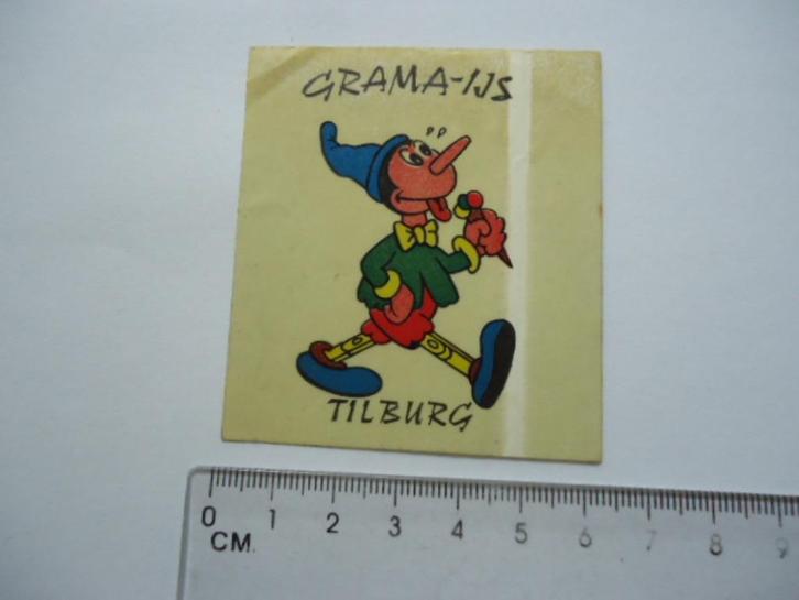 sticker oud Tilburg GRAMA IJS strip pinokkio ijsje vintage, Verzamelen, Stickers, Zo goed als nieuw, Bedrijf of Vereniging, Verzenden