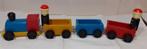 Vintage houten treintje met machinist wielen bakeliet, Ophalen of Verzenden, Gebruikt, Rij- of Hobbelspeelgoed
