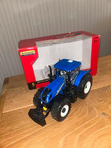 Britians New Holland T7.315 in doos beschikbaar voor biedingen