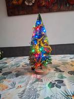 Kerstboompje vrolijk versiert, Ophalen