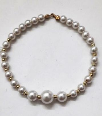 Leuke parel armband met ertussen gouden pareltjes (7969-24) beschikbaar voor biedingen