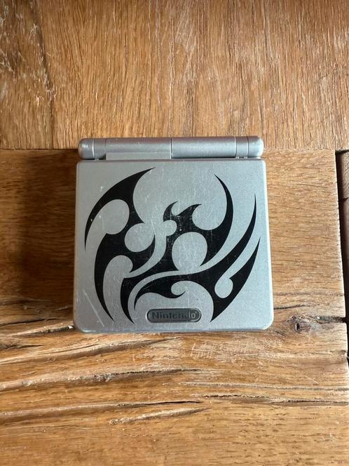 Gameboy advance sp tribal, Spelcomputers en Games, Spelcomputers | Nintendo Game Boy, Zo goed als nieuw, Game Boy Advance SP, Ophalen of Verzenden