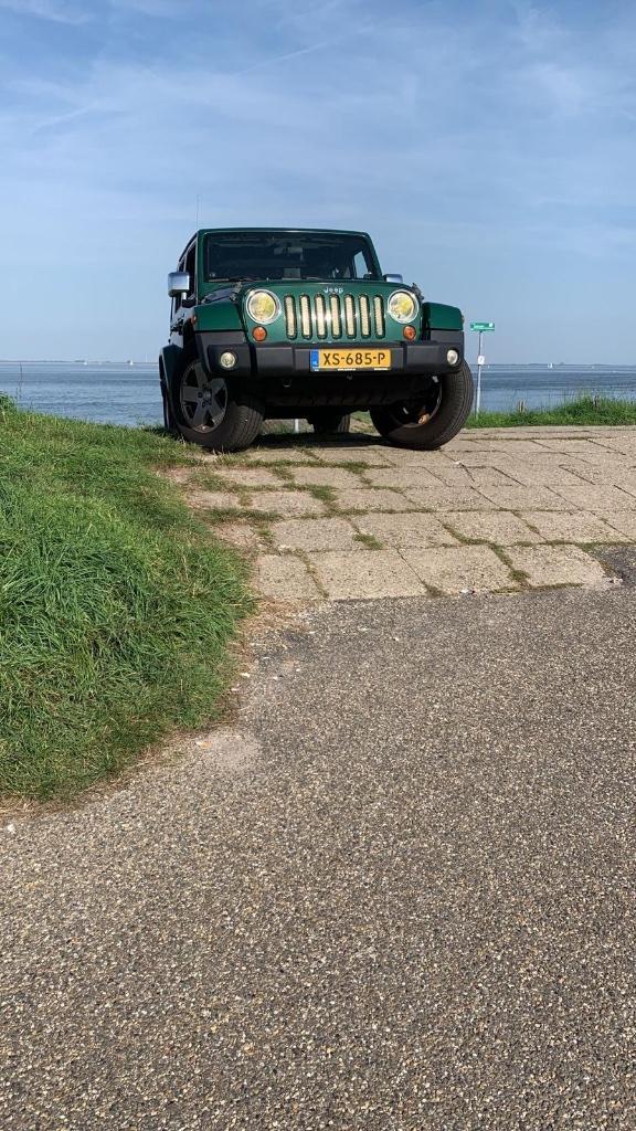 Jeep Wrangler 3.8 I V6 Unlimited AUT 2009 Groen, Auto's, Jeep, Particulier, Wrangler, 4x4, Achteruitrijcamera, Airconditioning