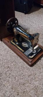 Antieke naaimachine, Ophalen