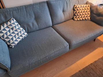 Leuke blauw/groene zitbank met hocker