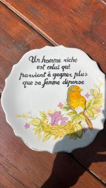 Wandbord met Franse spreuk beschikbaar voor biedingen