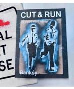BANKSY Cut and Run - Boek en Tas, nieuw merchandise Set, Nieuw, Ophalen of Verzenden, Boek, Tijdschrift of Artikel, H