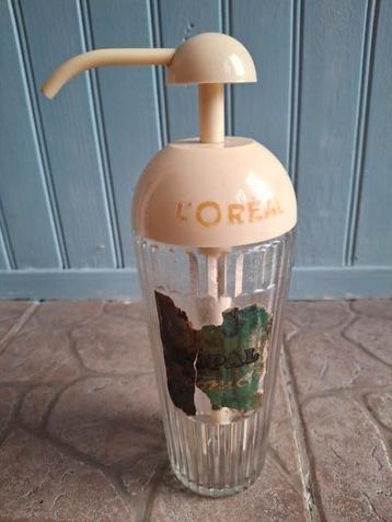 Origineel vintage L'Oréal dispenser uit jaren '50 beschikbaar voor biedingen