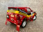 Mitsubishi Pajero Dakar 2001 1:18 Jutta Kleinschmidt, Hobby en Vrije tijd, Modelauto's | 1:18, Ophalen of Verzenden, Zo goed als nieuw