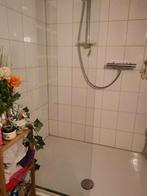 Glaswand douche en bak, Ophalen