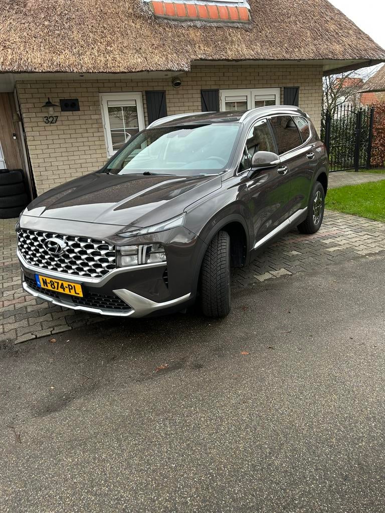 Hyundai Santa Fe 1.6 T-gdi HEV 230pk Aut. 2022 apk febr. 28, Santa Fe, 4 cilinders, Bruin, 179 pk