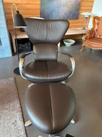 Leolux fauteuil met hocker, Ophalen