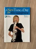 Saxofoon lesboek, a new tune a day for alto saxophone, Muziek en Instrumenten, Bladmuziek, Ophalen, Overige genres, Zo goed als nieuw
